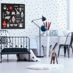 Teenager's bedroom interior with telescope