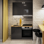 Biale-tlo-aranzacyjne-pozwala-wyeksponowac-zolte-i-szare-elementy-wyposazenia.-Na-zdjeciu-kuchnia-Flinton.-Fot.-RuckZuck