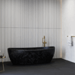 Luxum, Beton ryflowany Nivolet bialy; umywalka, blat i wanna na wymiar - Corian®Cosmos Prima; tynk dekoracyjny Cemento naturale